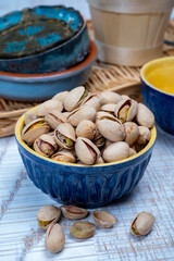 Roasted salty pistachio nuts, tasty healthy vegetarian snack food