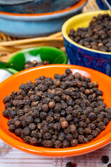 Indian spices collection, dried black peppercorns, kitchen spices
