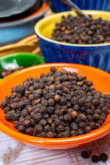 Indian spices collection, dried black peppercorns, kitchen spices
