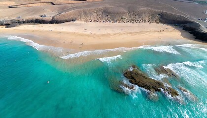 beach with turquoise water on fuerteventura island spain canary islands aerial view of sand beach...