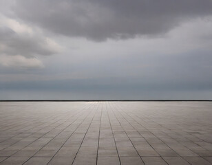 The horizon and the cloudy sky as a background, in the foreground an empty square