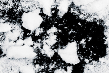 White snow on a black background.