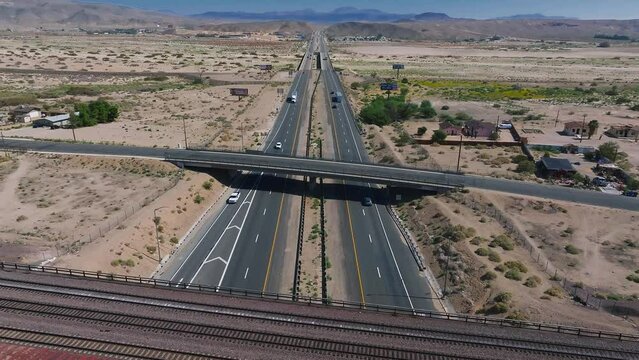 Aerial view of the Barstow city in California. A route 66 cowboy town. Small town with classical restaurants, train station and narrow streets in the middle of a desert.