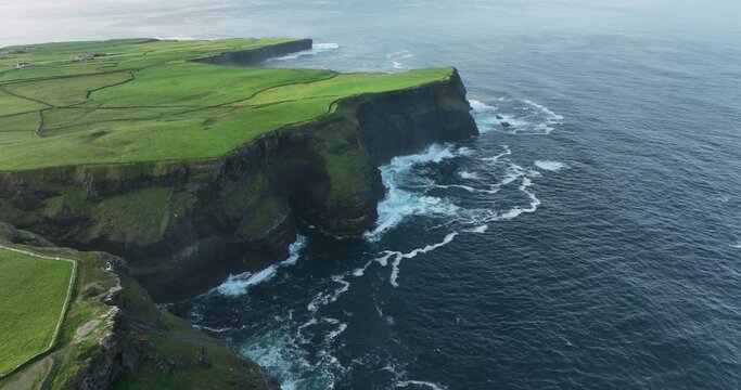 Rocky coastline along the Atlantic Ocean shoreline in 4k