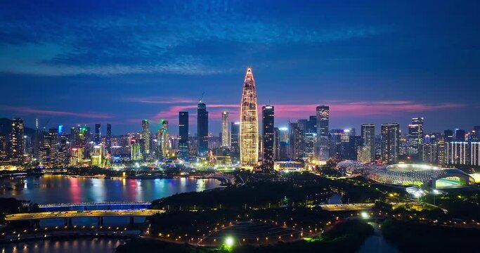 Aerial shot of Shenzhen Financial District skyline at night in Guangdong Province, China. Creative category video without architectural logos