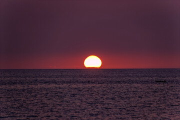 Sunset over the sea at Kona on Big Island of Hawaii