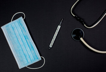 Medical instruments on a black background, doctor tools for treating people from illness