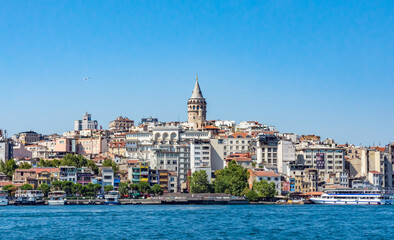 View of Galata Tower from Galata Bridge in Istanbul, Turkey.