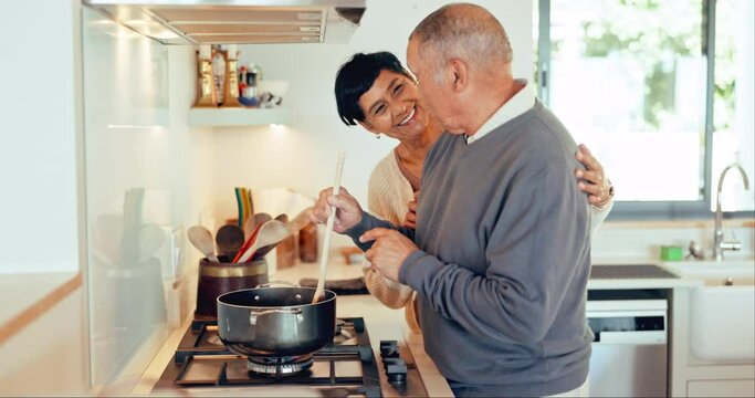 Food, cooking and a senior couple in the kitchen together, bonding while in their home to prepare a meal. Dinner, love or smile with a happy old man and woman getting cuisine ready for nutrition