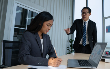 angry asian  business man bully business woman