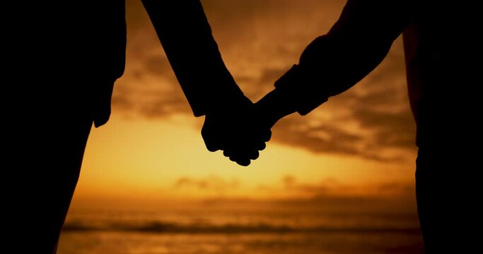 Beach silhouette, holding hands and sunset couple bonding, relax and enjoy quality time, ocean freedom or wellness. Marriage love, unity support care and people together at sea view, nature or dusk