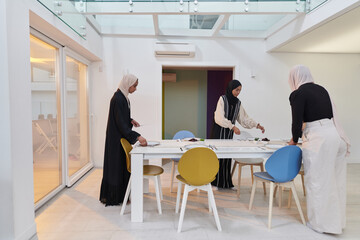 Group of young Arab women come together to lovingly prepare an iftar table during the sacred Muslim month of Ramadan, embodying the essence of communal unity, cultural tradition, and joyous
