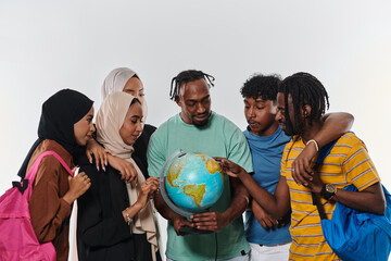 A diverse group of students is gathered around a globe, engrossed in exploration and study, their...