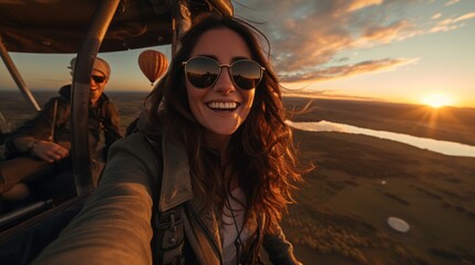 taking selfie during sunrise hot air balloon - Powered by Adobe