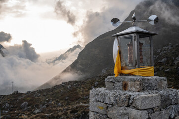 Wind powered prayer wheel in Kyanjin Gompa village of Nepal.