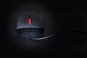 Computer mouse in dark colors
