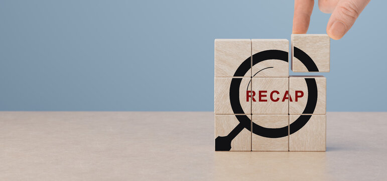 Recap on wooden cubes. Recap economy, business, financial concept. Business plan in 2024. RECAP words and magnifying glass icon on wooden cubes. copy space