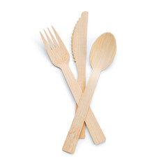 Set of table ware with fork knife and spoon. Bamboo wood biodegradable recycled materials isolated on white.