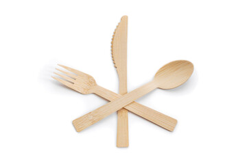 Set of table ware with fork knife and spoon. Bamboo wood biodegradable recycled materials isolated on white.