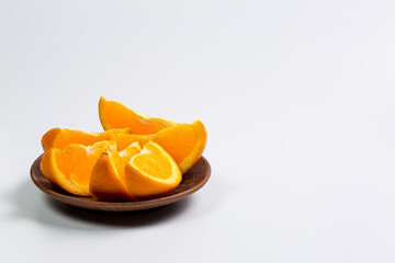 Slices of orange sweet orange on a white background, citrus fruit on a white background