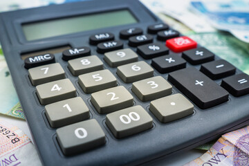 Close up on a Calculator accounting concept Polish zloty banknote background currency