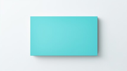 A turquoise invitation card isolated on a clean white surface, the HD image emphasizing its refreshing color and modern design.