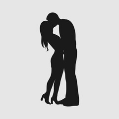silhouette of a guy and a girl kissing
