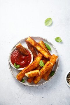 Traditional roasted halloumi cheese with tomato sauce