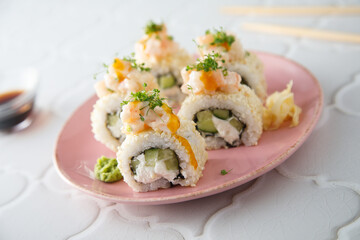 Shrimp sushi rolls with mango sauce