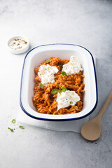 Pasta with tomato sauce, eggplant and cheese