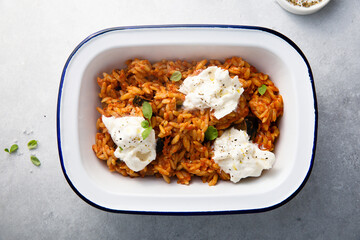 Pasta with tomato sauce, eggplant and cheese