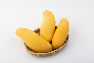 yellow mangos on white background