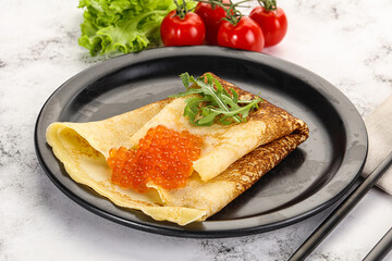 Russian pancake with red caviar