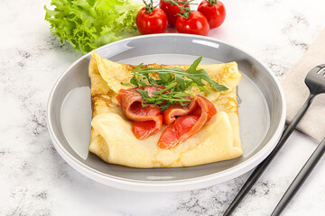 Russian pancake with salmon fish