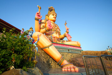 The giant sculpture of Shiva is a sunny day. Koneswarm Kovil Hindu Temple. Trincomalee, Sri Lanka