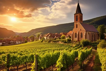 Foto op Canvas Summer sunset view of the medieval church of Saint-Jacques-le-Major in Hunawihr, small village between the vineyards of Ribeauville, Riquewihr and Colmar in Alsace, wine making region of France © muhmmad