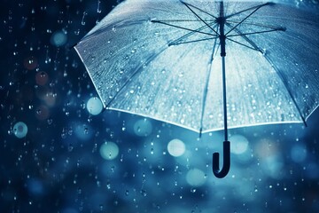 Transparent umbrella under rain against water drops splash background. Rainy weather concept 