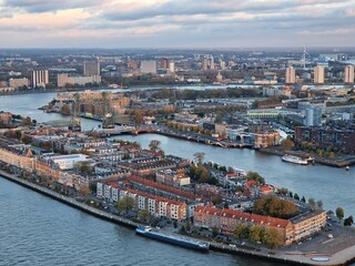 Aerial close-up of Noordereiland, island in the river Meuse in Rotterdam, and skyline