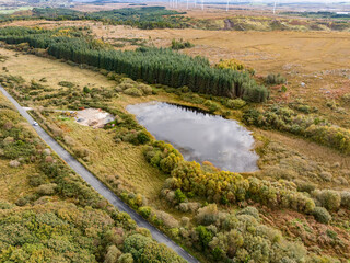 Fototapeta na wymiar Aerial of lake in a peatbog by Clooney, Portnoo - County Donegal, Ireland.