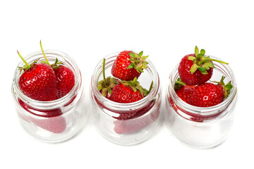 Red ripe strawberries on a white background, strawberries for dessert