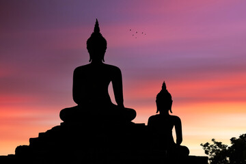 buddha statue in the sunset