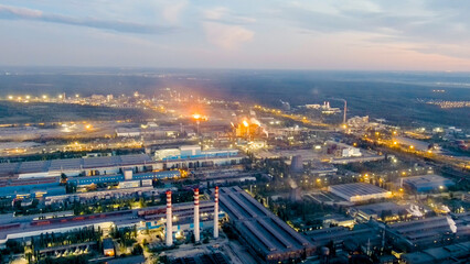 Fototapeta na wymiar Lipetsk, Russia. Iron and Steel Works. Left Bank District. Time after sunset. Night, Aerial View