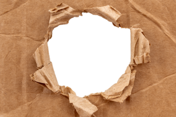 Hole in cardboard. A torn piece of cardboard or paper. Blank space for text