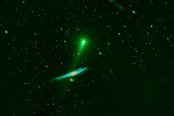 Comet in space. Elements of this image furnished by NASA