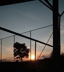 fence at sunset