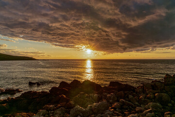 Sunset with dramatic clouds near Porthmeor Beach in St Ives, Cornwall, England, UK