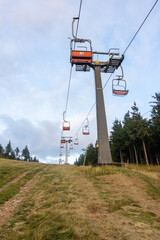 Hiking trail to the top of Serak in Jeseniky mountains in Czech republic from Ramzova and chairtrails vertical photo.