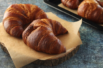 Freshly baked croissants on the table