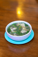Thai Food of Spicy Bamboo Shoot and Pork Soup on Wooden Table