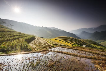 Zelfklevend Fotobehang Mu Cang Chai Mu Cang Chai’s sheer rice terraces were sculpted over centuries of small-scale cultivation. Each season brings its own charm.